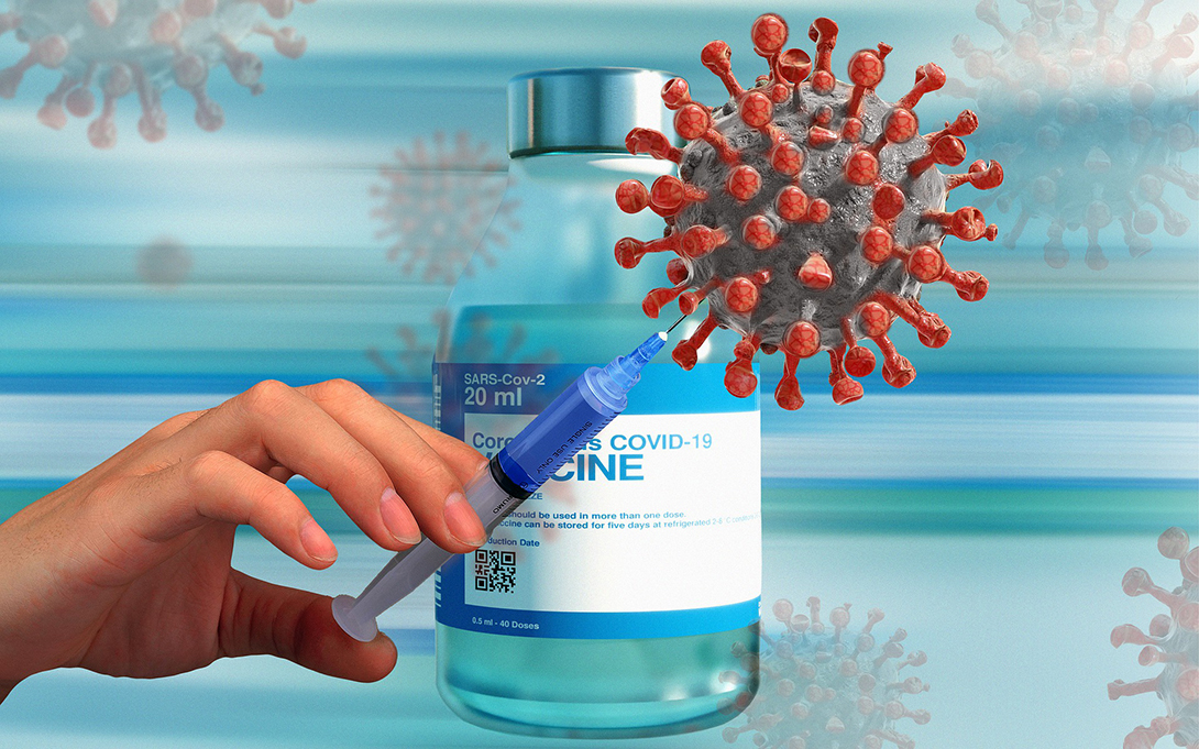 Hand injecting covid-19 vaccine into virus
