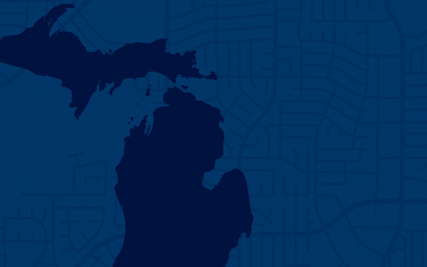 A blue map of Michigan layered over a blue neighborhood map